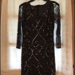 Woman’s holiday/wedding attire